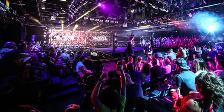 A live audience and production lighting inside Epic Studios